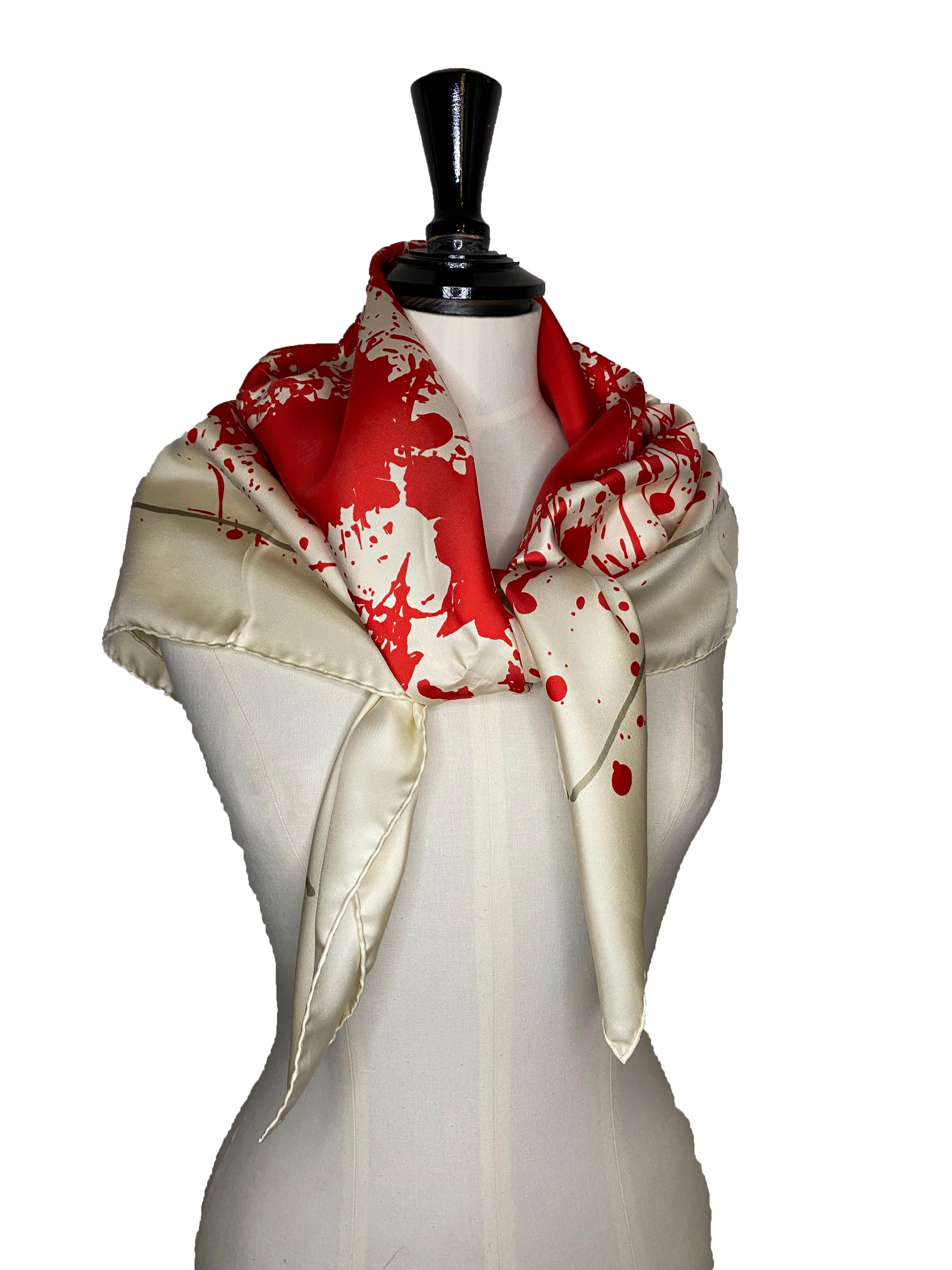 Silk scarf from Hermes. First designed by Dimitri Rybaltchenko in monochrome in 2004, the scarf was relaunched in dazzling colourways in 2016. The Hermes horse is hidden in the abstract paint pattern, hence the surprise. Our remix scarf comes in