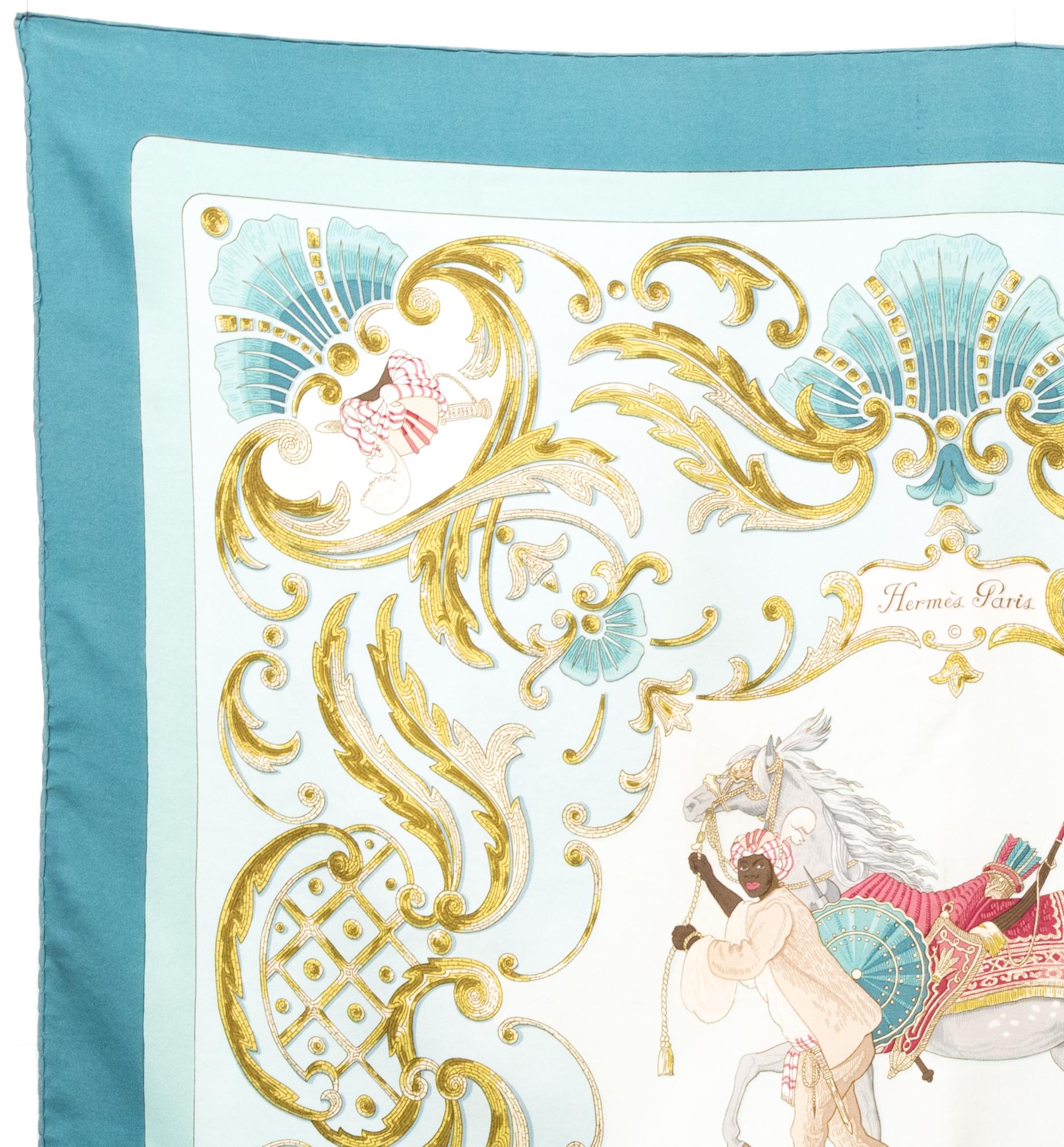 Hermes silk scarf Cheval Turc by Christiane Vauzelles featuring a blue border, a horse scene and a top logo signature. 
In good vintage condition. Made in France. 
First issue: 1969s
35,4in. (90cm)  X 35,4in. (90cm)
We guarantee you will receive
