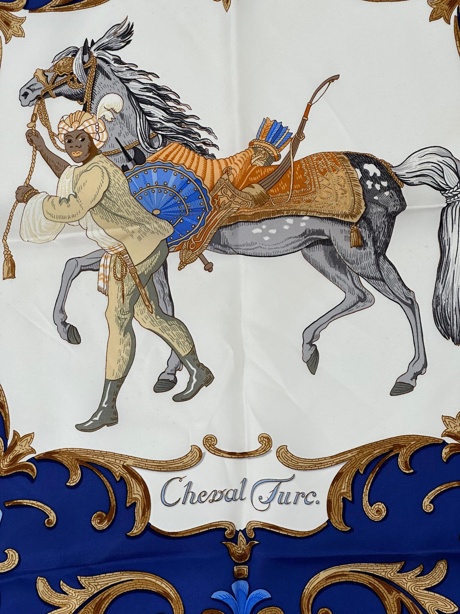  Hermès silk twill scarf, Cheval Turc, designed by Christiane Vauzelles, who illustrated the lovely Turkish horse, this scarf was first introduced in 1969. This scarf is in excellent condition with no issues. Tags are attached. Crisp silk & plump