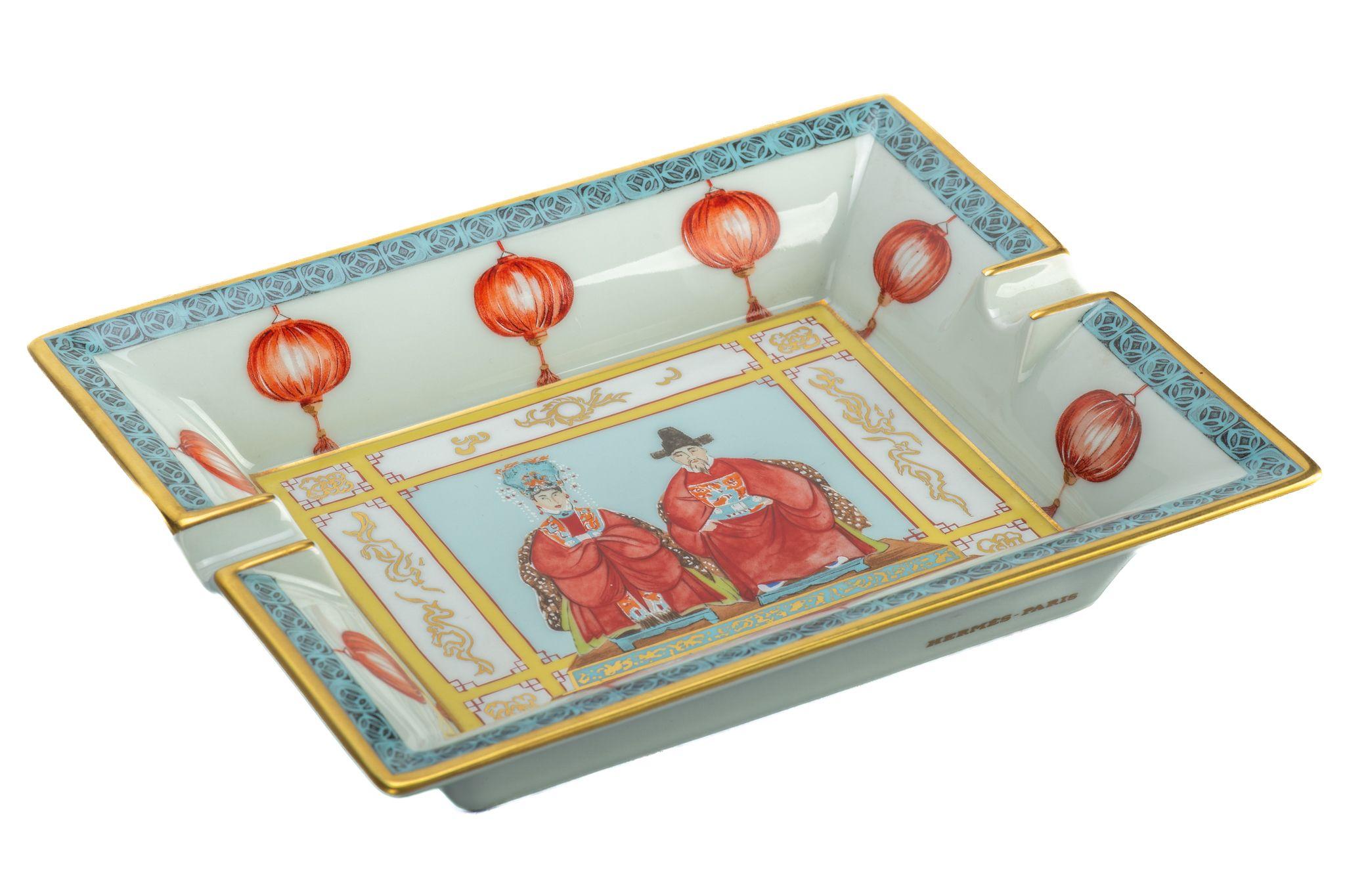 Hermes light blue, yellow and red porcelain ashtray with Chinese figures design
