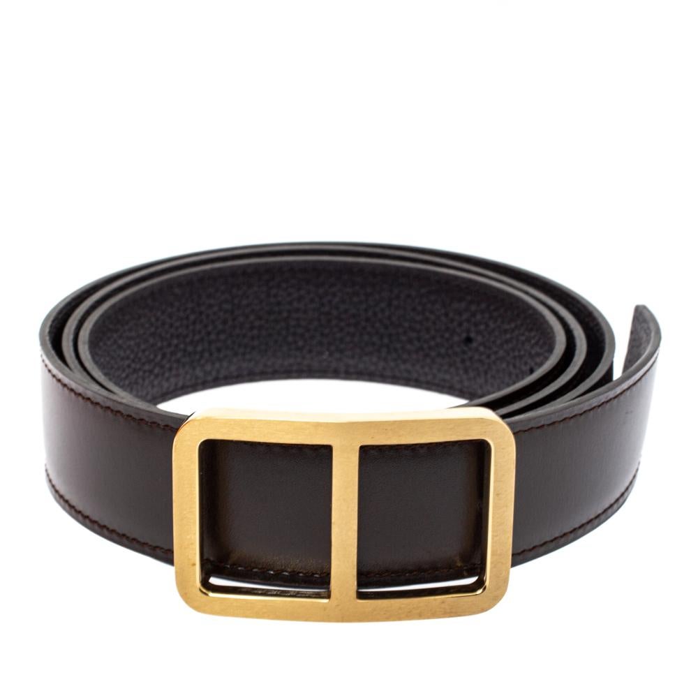 Belts are a great accessory to lift a look. This one by Hermes is crafted from leather and finished with a gold-tone buckle. It is a versatile creation as it gives you the option of two reversible sides: chocolate brown and black.

Includes: