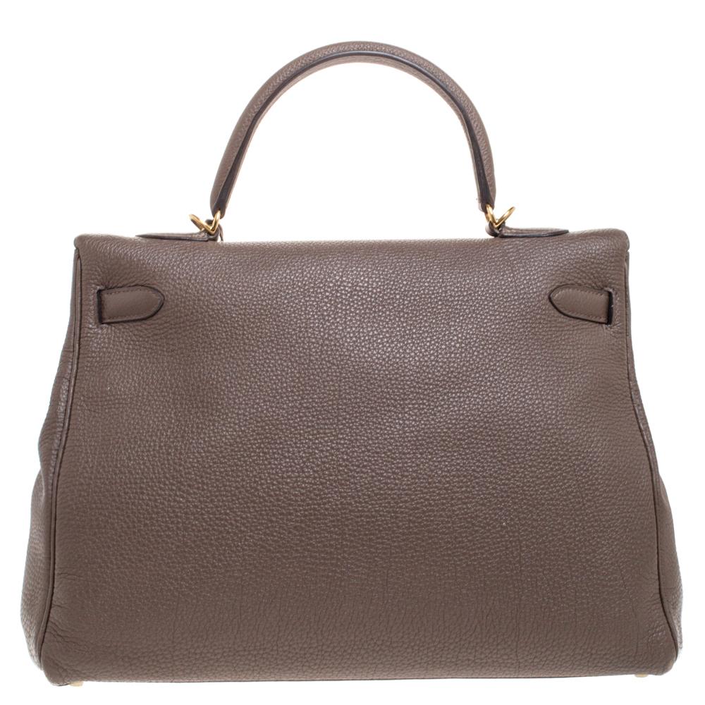 Inspired by none other than Grace Kelly of Monaco, Hermes Kelly is carefully hand-stitched to perfection. This Kelly Retourne is crafted from Togo leather and has gold-tone hardware. Retourne has a more casual look and is stitched on the inside thus