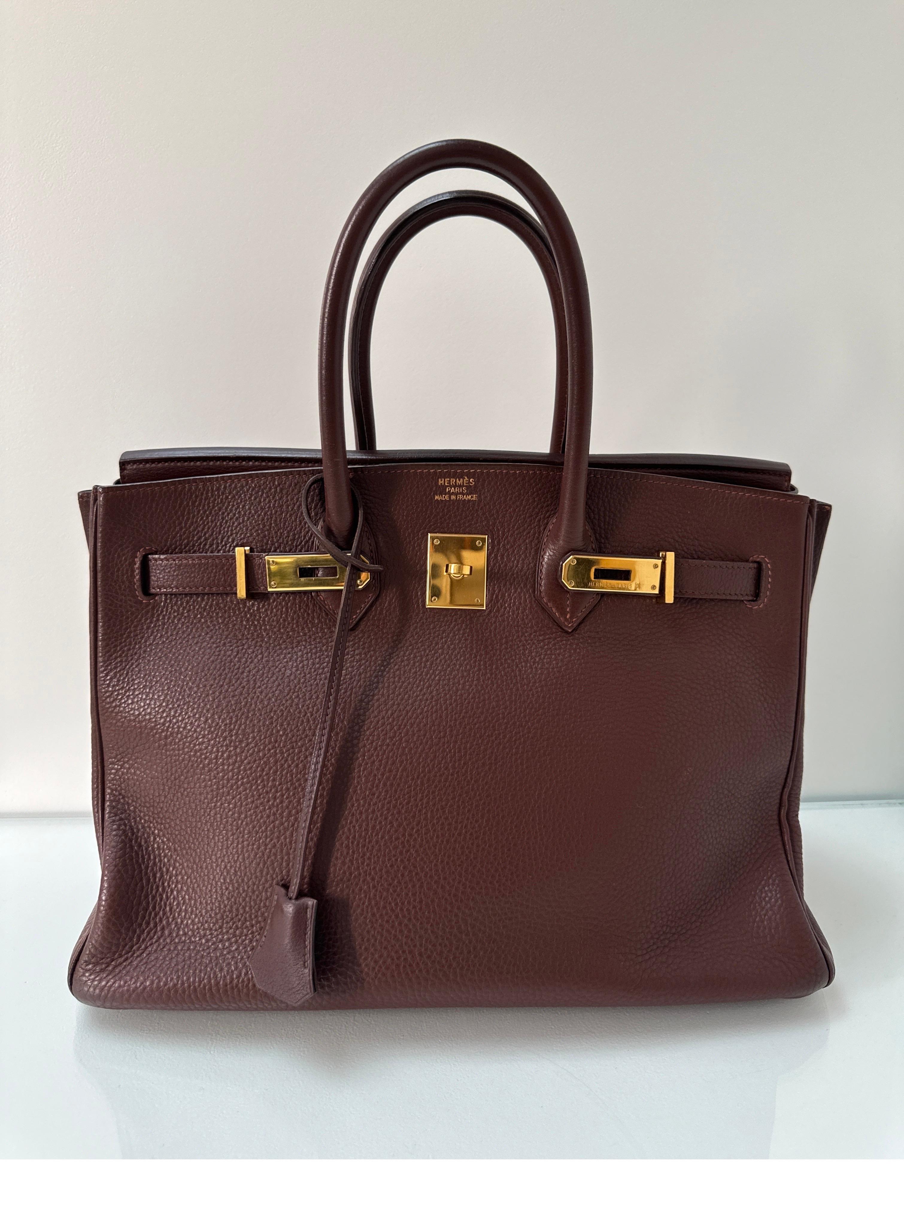 Hermes Chocolate Birkin 35 Bag. Chocolate brown togo leather with gold hardware. Interior clean. Very good condition. Rare color and most wanted color this season. Vintage Birkin is highly desired now. Includes clochette, bag and dust bag. No lock