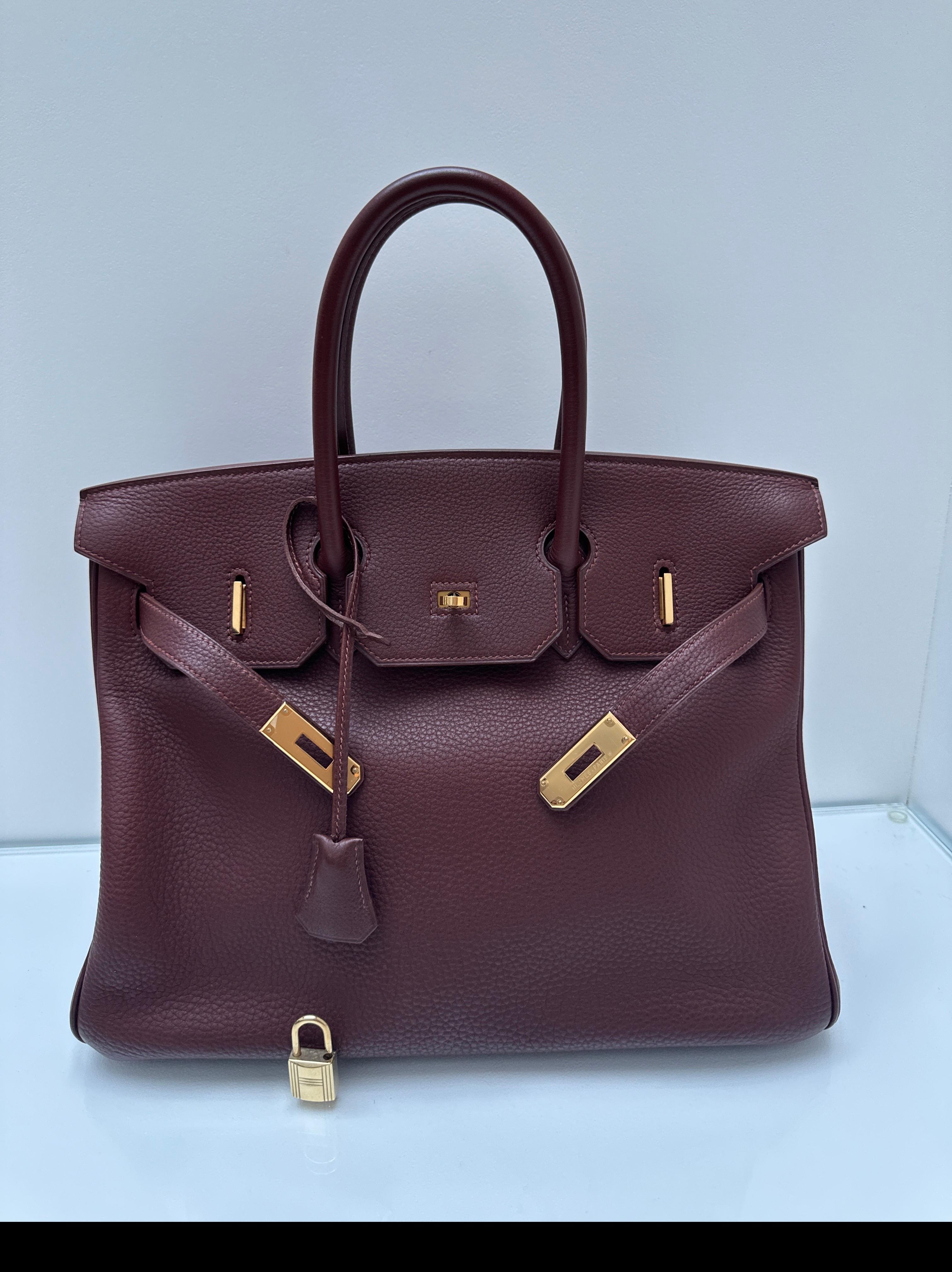 Hermes Brown Chocolate Brown Birkin 35 Bag. Dark brown color with gold hardware. Interior clean. Excellent condition. Most wanted color of the year. Includes clochette, lock, keys, and dust bag. Guaranteed authentic. 