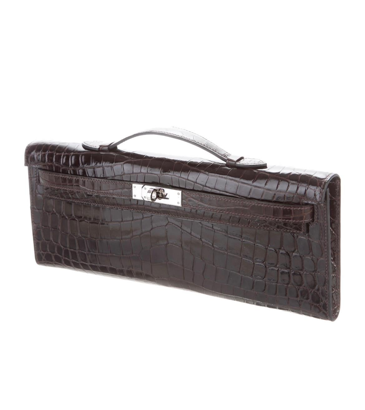 Crocodile
Palladium plated hardware
Leather lining
Turnlock closure
Top Handle 1