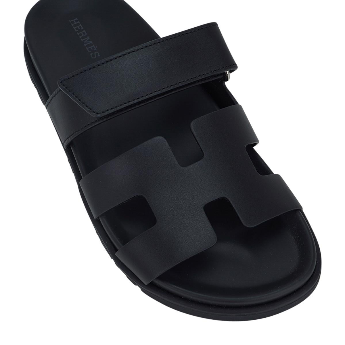 Mightychic offers a pair of limited edition Hermes Chypre sandals featured in Black.
Calfskin with black anatomical insole and H embossed Black rubber sole.
Strap across foot is adjustable with velcro closure.
Comes with sleepers and and signature