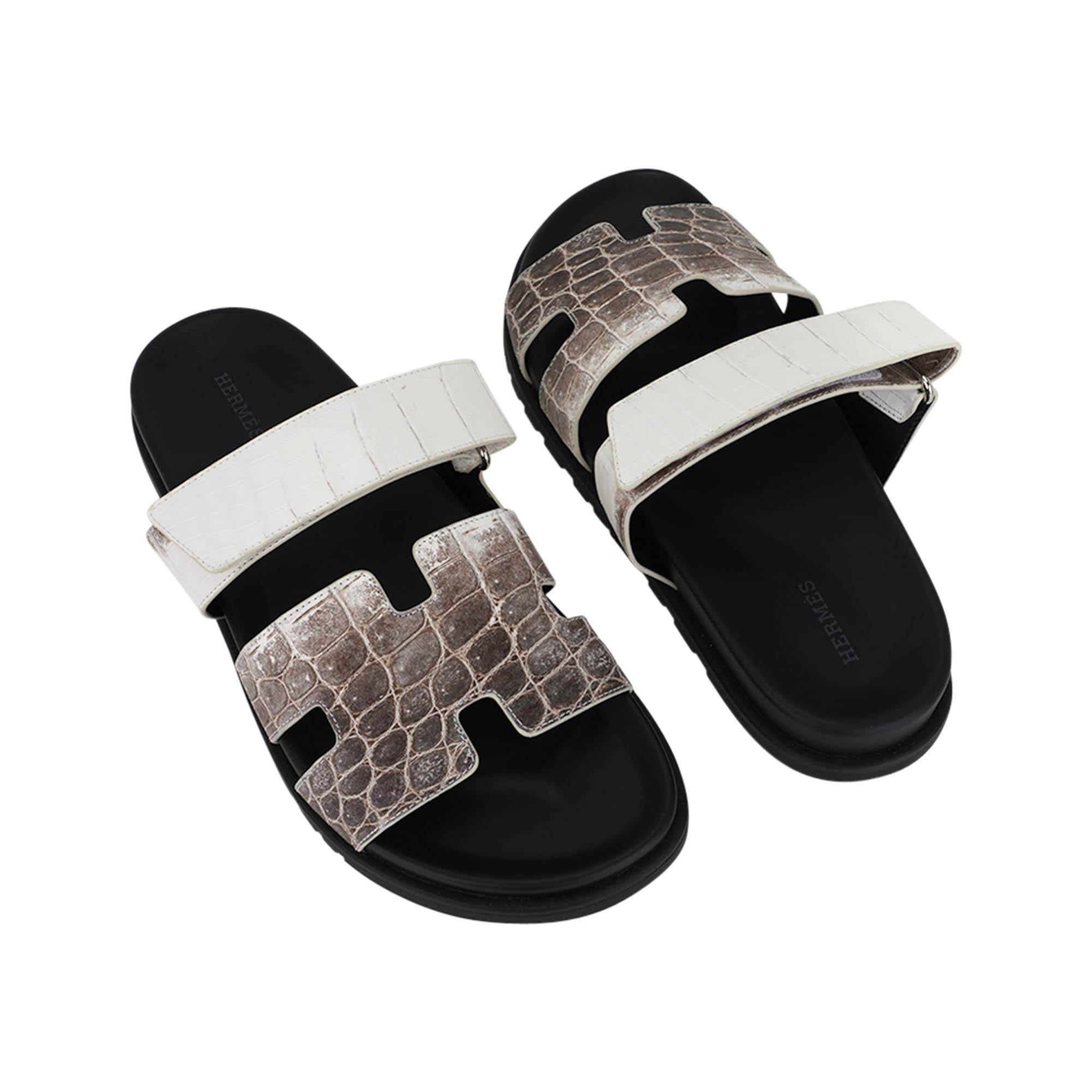 Mightychic offers a limited edition Hermes Chypre Men's sandal featured in Himalaya crocodile.
Exquisite Himalaya with black anatomical insole and H embossed black rubber sole.
Strap across foot is adjustable with velcro closure.
A testament to