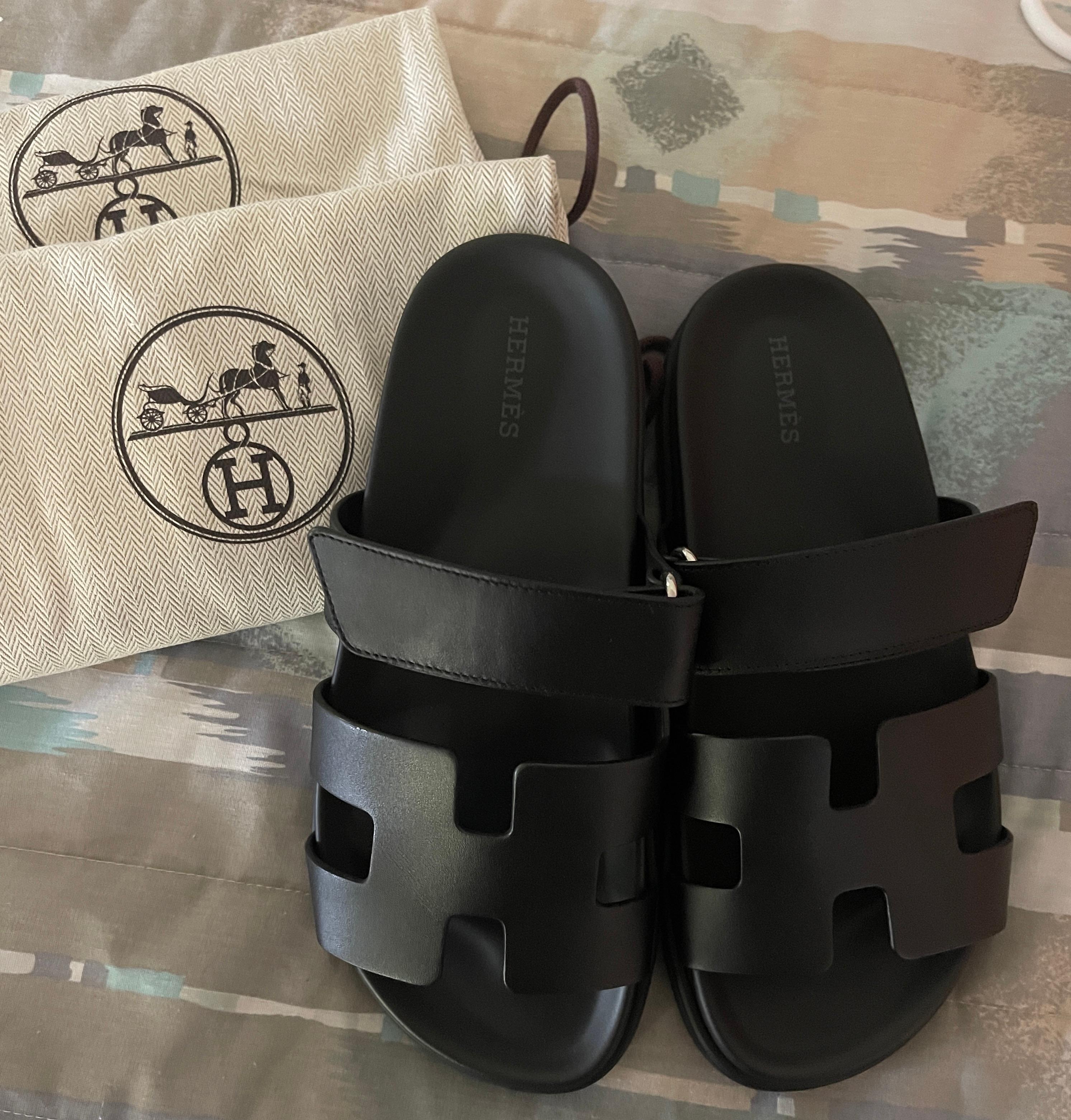 Hermes Chypre Sandal
Techno-sandal in calfskin with anatomical rubber sole and adjustable strap.
A sleek design for a comfortable casual look.

SOLDOUT
We only have this one pair 
No others in stock
37.5


Made in Italy
Black rubber sole
Black