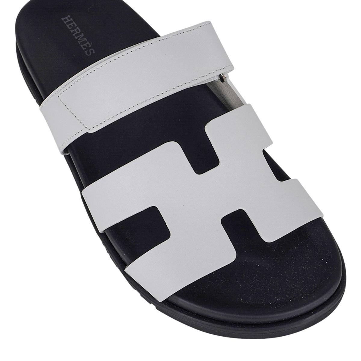 Mightychic offers a limited edition Hermes Chypre Sandal featured in White.
Calfskin with black anatomical insole and H embossed Black rubber sole.
Strap across foot is adjustable with velcro closure.
Comes with sleepers and and signature Hermes