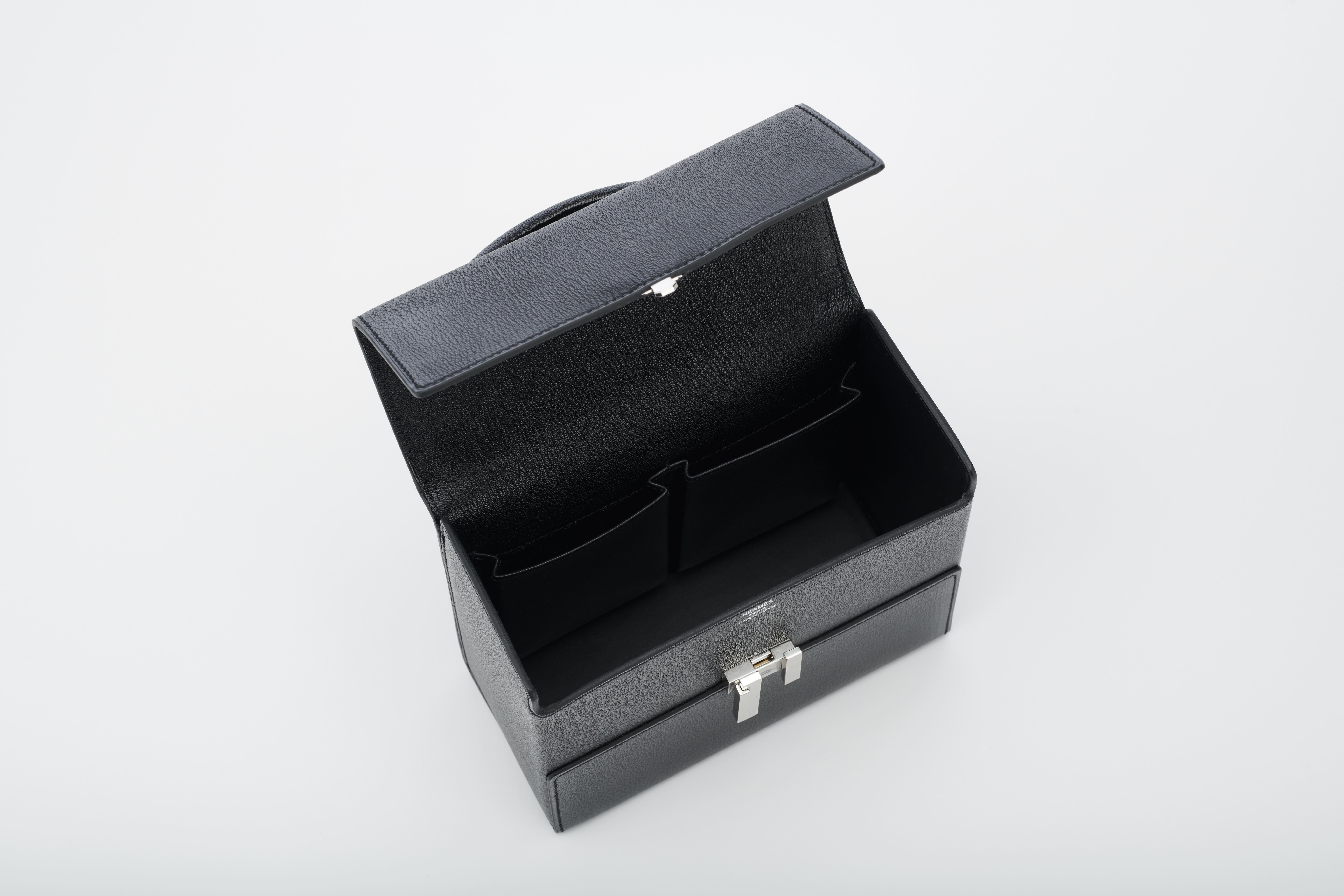 Women's or Men's Hermès Cinhetic in Black Chevre Leather with Palladium hardware. 