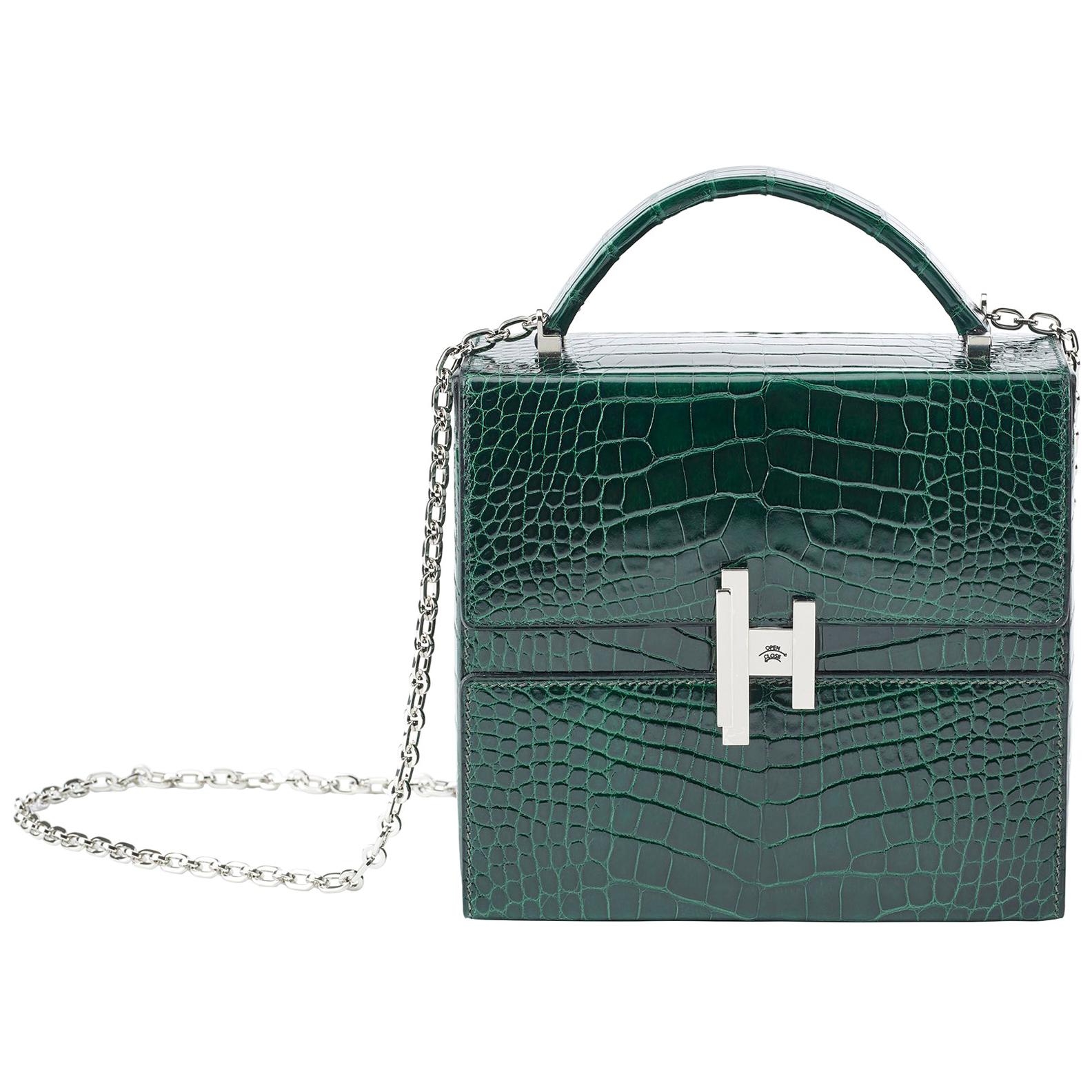 Hermès Cinhetic in Vert Fonce Verso Alligator Leather with Palladium hardware.