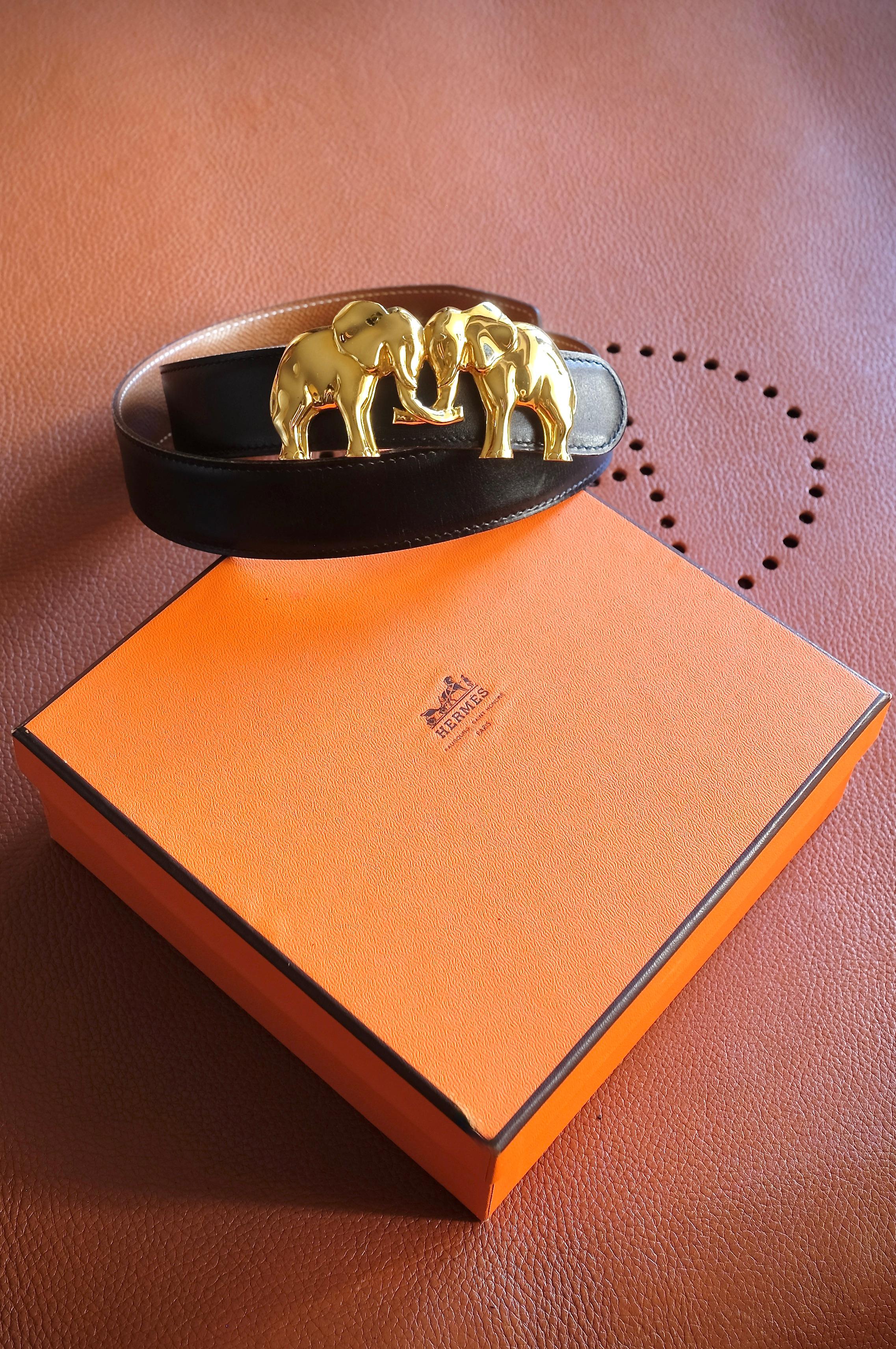Hermès Vintage Selection - Rare belt with stunning gold-plated bronze buckle depicting two elephants, sold with original dustbag and box. Belt size is 70 ( actual length of skin 85 cm ) marked with letter B on square year 1998.
