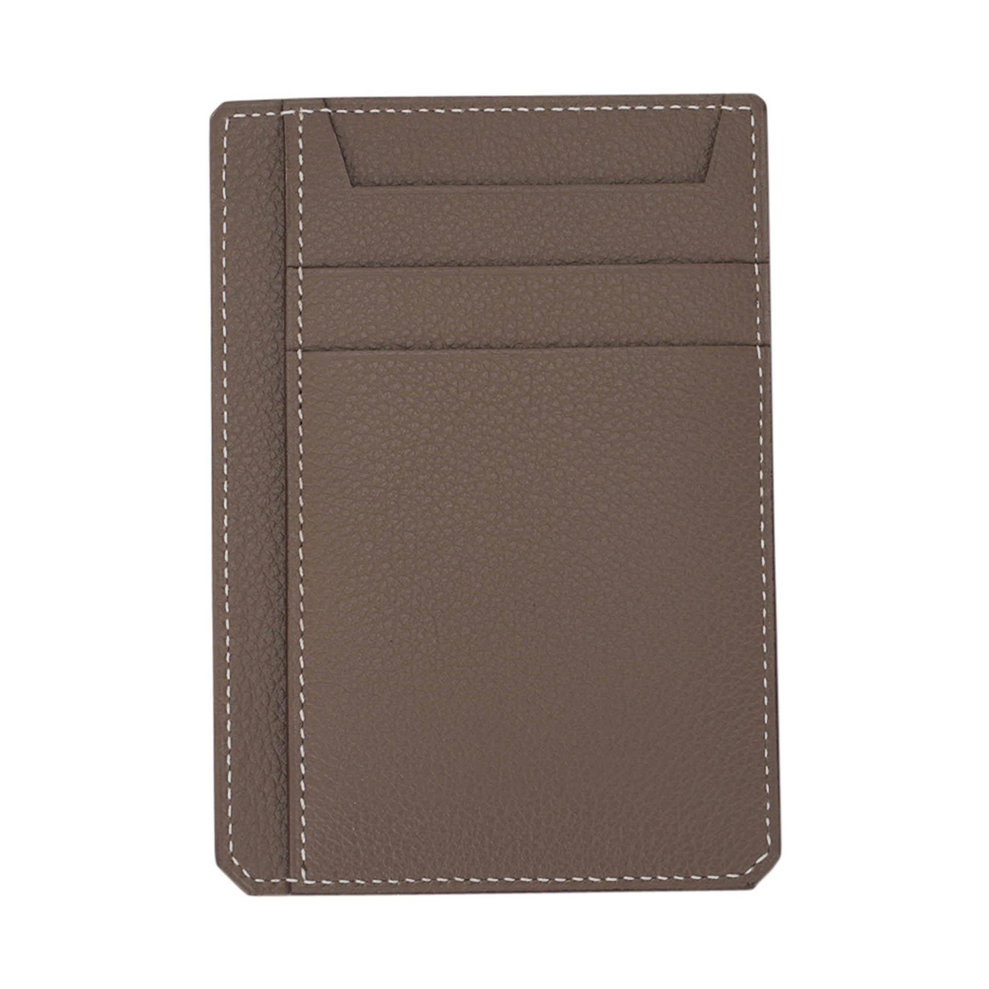 Mightychic offers an Hermes 8CC Card Holder featured in Etoupe with White Topstitch.
As part of the City line of cardholders, it is compact and lightweight.
There are 8 slots for business and or credit cards inside.
Neutral and beautiful in