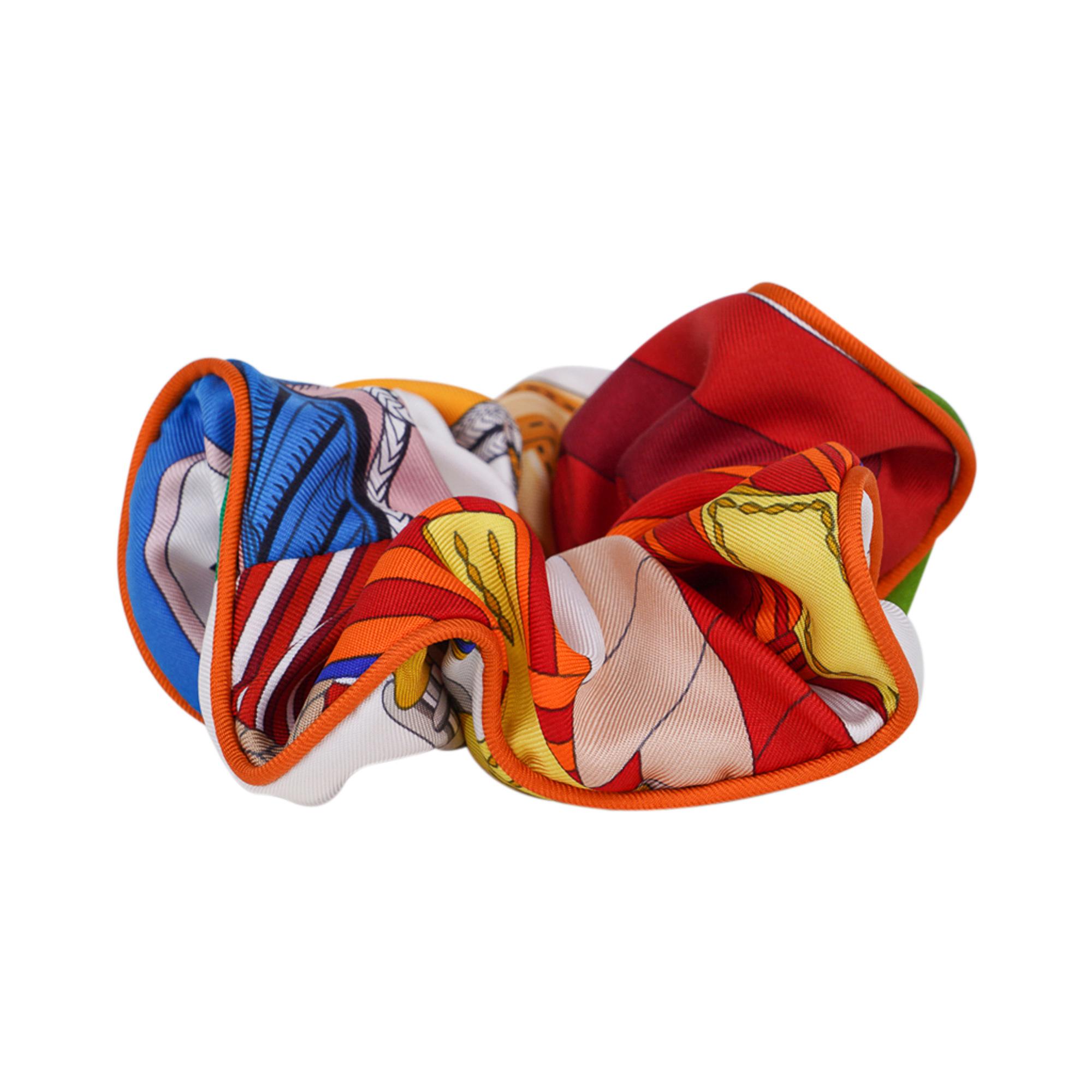 Mightychic offers a guaranteed authentic Hermes Claudia Scrunchie.
In Multicolor patchwork printed silk. 
Label printed HERMES PARIS Made in France. 
Comes with signature Hermes box.
New or Store Fresh Condition
final sale

CONDITION:
New or Store