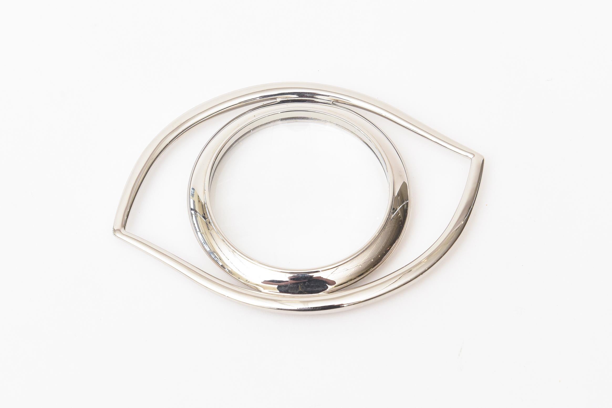 This ever so chic Hermès vintage silver plated Cleopatra eye magnifier is a great desk accessory. This is from the 1960s and was originally designed by Jean Cocteau for Hermès. It has occult and has Egyptian historical meaning. This one is marked