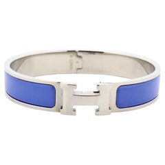 Hermes Clic Clac bangle bracelet in blue metal with palladium-plated hardware