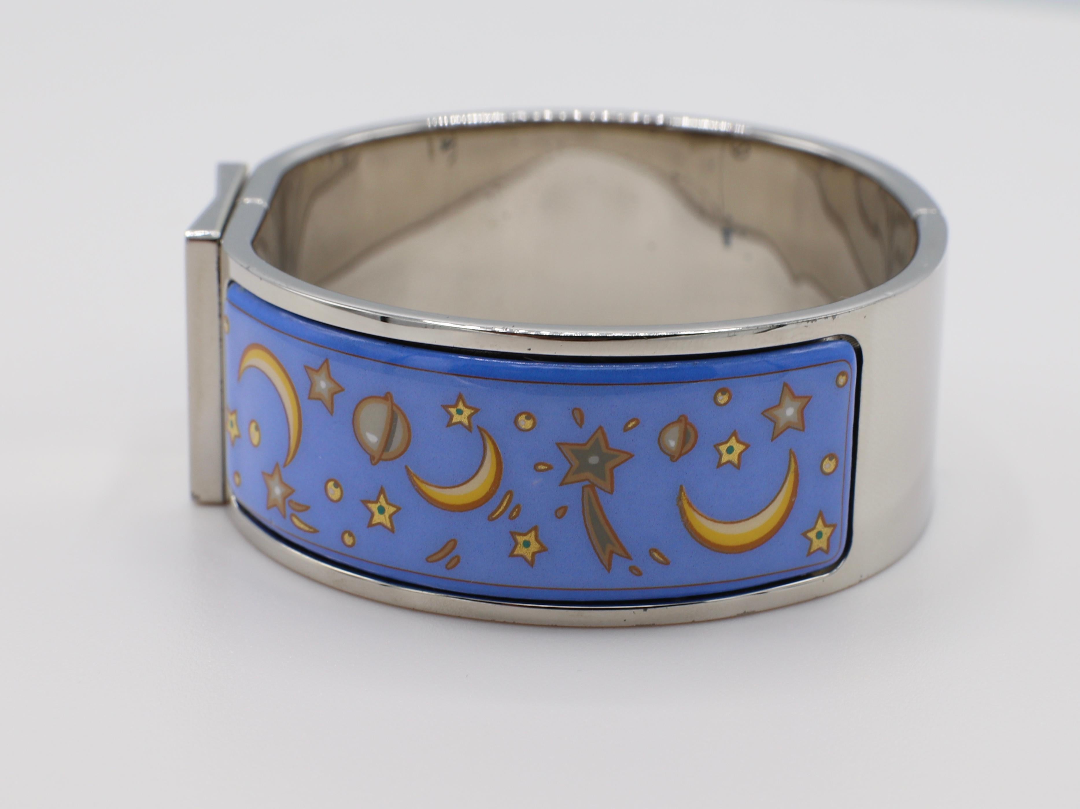 Hermes Clic Clac Enamel Bracelet Moon & Stars 

Diameter: 2.44 inches
Width: .78 inches 
Weight: 60.9 grams 