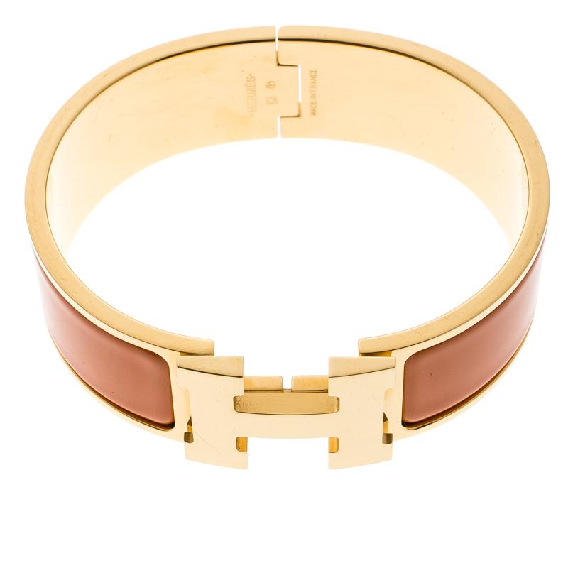 Hermes Clic Clac H Gold Plated Orange Enamel Bracelet In Good Condition In Dubai, Al Qouz 2