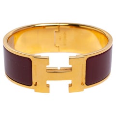 Hermès Clic Clac H Rouge Enamel Gold Plated Narrow Bracelet PM