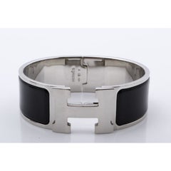 Hermes Clic Clac Wide bangle bracelet in black metal with palladium-plated