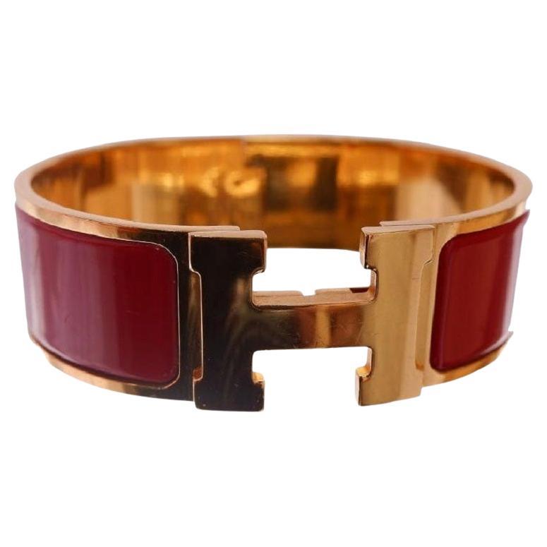 Hermes Clic Clac Wide Bangle Bracelet in Red Metal with Gold-Tone Hardware For Sale