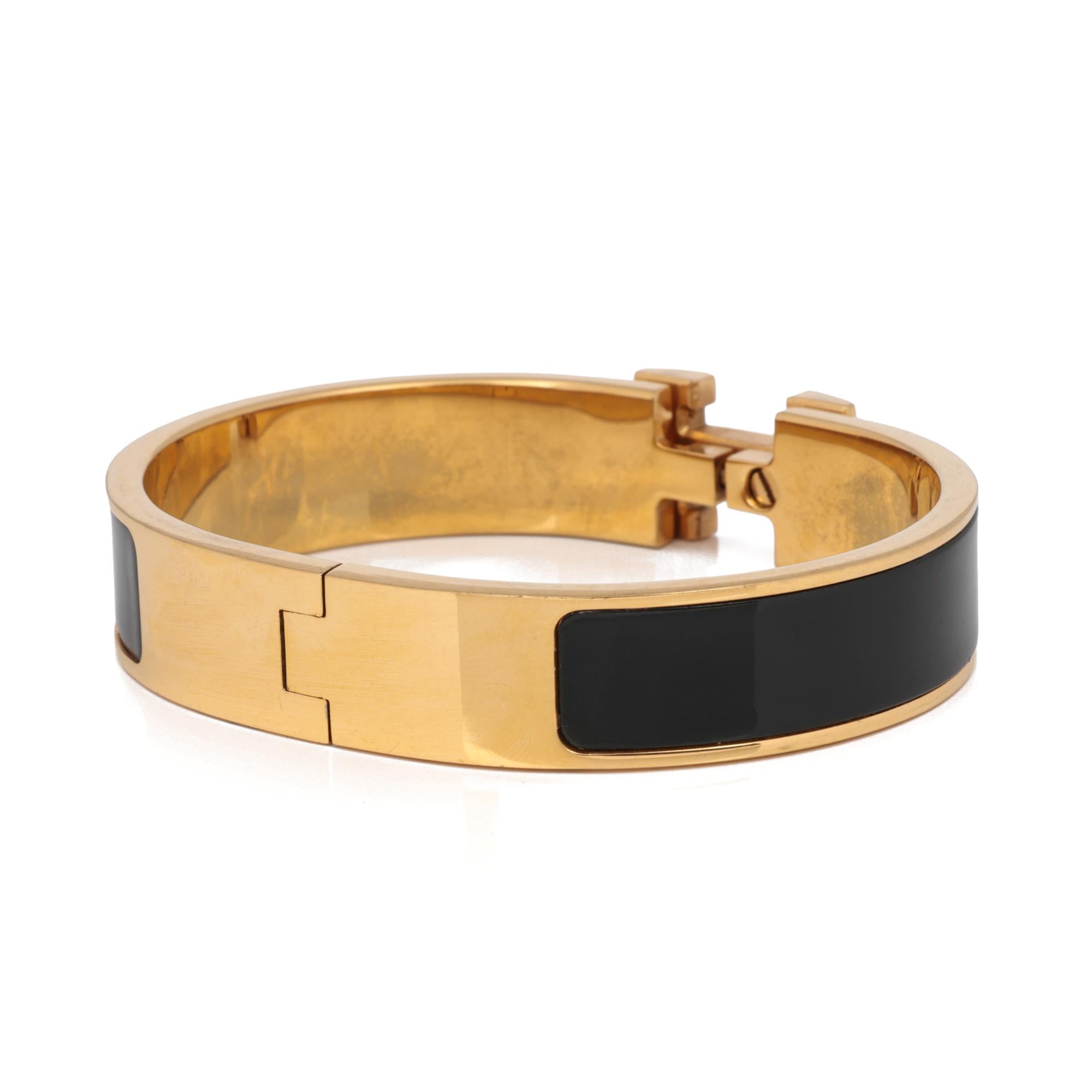 Hermès Clic H Armreif

ITEM-ZUSTAND	Ausgezeichnet
HERSTELLER	Hermès
ARMBANDBREITE	17mm
LÄNGE DES ARMBANDS	15.5 cm Innenumfang
GESAMTGEWICHT	40.4g