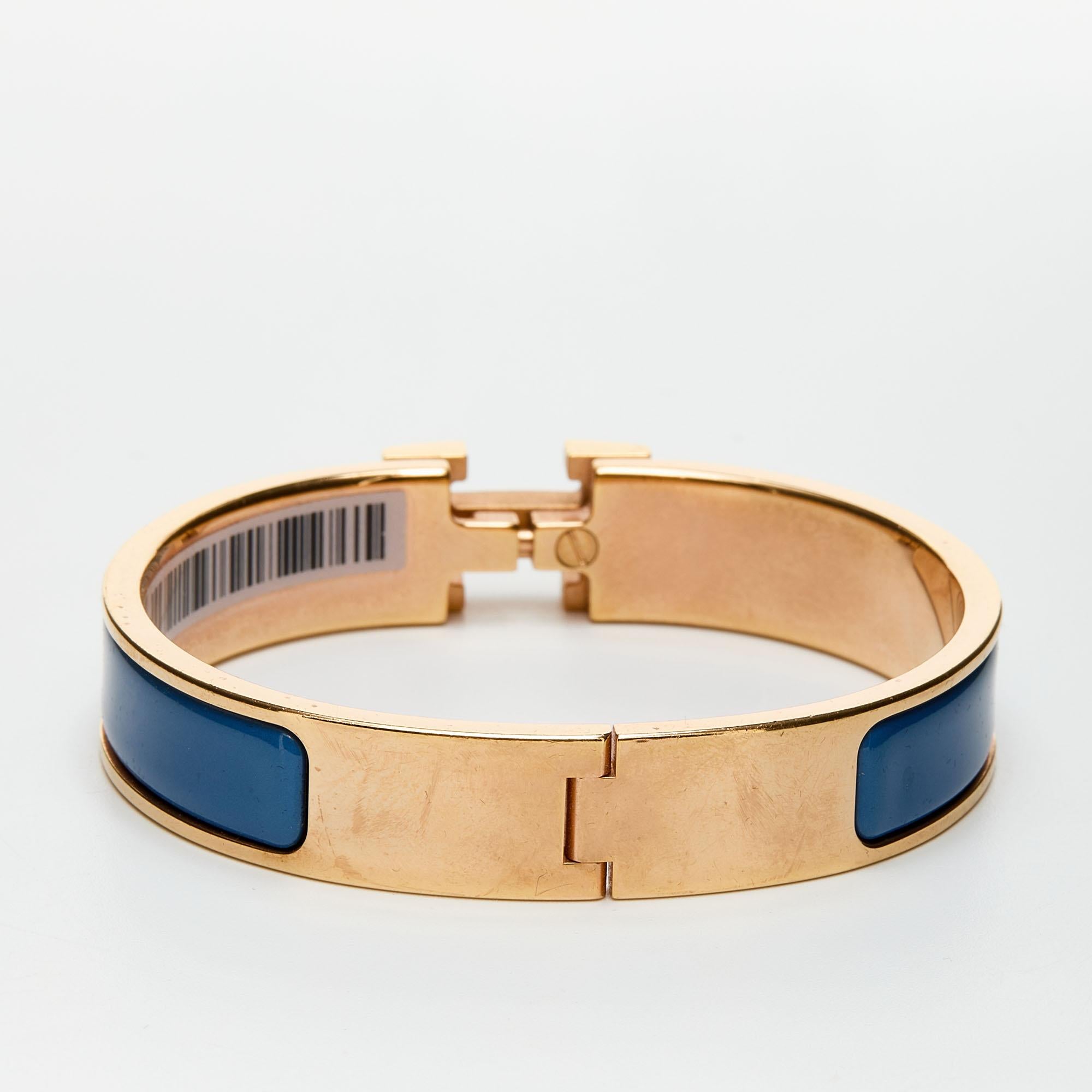 This bracelet embodies Hermès’ elegant craftsmanship with its gold-plated body and an enamel inlay. Featuring the iconic H logo of the fashion house at the front, this bracelet is the accessory to buy today!

Includes: Original Dustbag, Original
