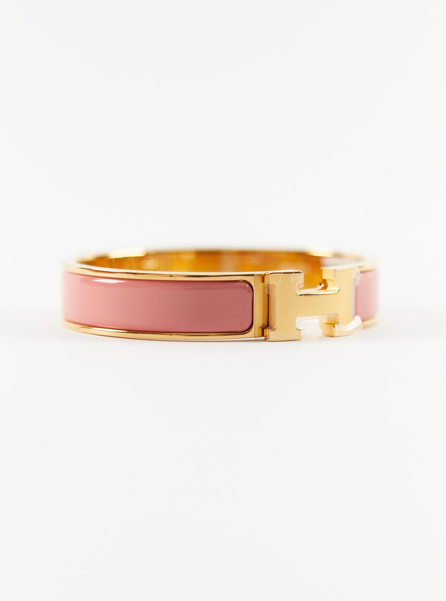 Hermès Clic H PM Bracelet in Papaye and Gold

Wrist size: 16.8 cm  Width: 12 mm

Made in France

