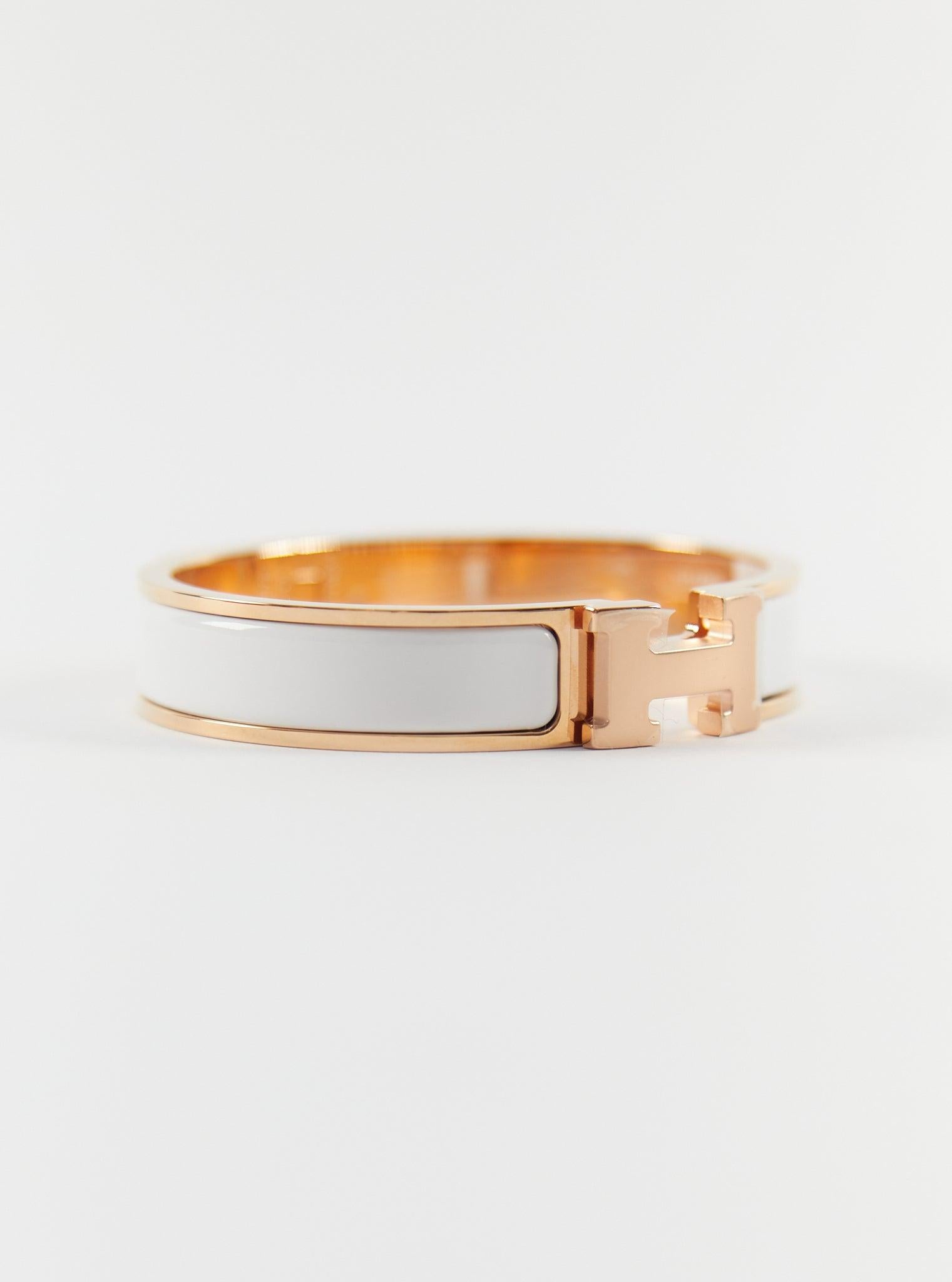Hermès Clic H PM Bracelet in White and Rose Gold

Wrist size: 16.8 cm  Width: 12 mm

Made in France
