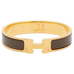Vergoldetes schmales Clic H-Armband aus brauner Emaille von Hermès