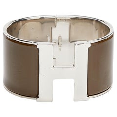 Bracelet Hermès Clic H en métal plaqué émail marron et palladium, XL