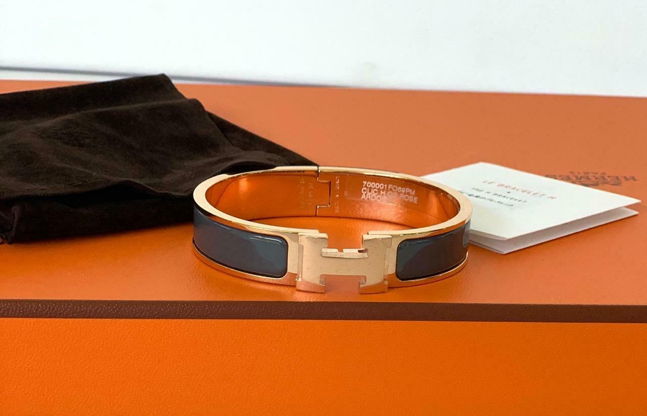 Hermes Clic  H bracelet in Rose Gold Plated 
Color: Ardoise
A medium Grey
Circumference: 7