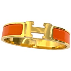 Hermes Clic H Enamel Bangle Bracelet Orange Yellow Gold PM