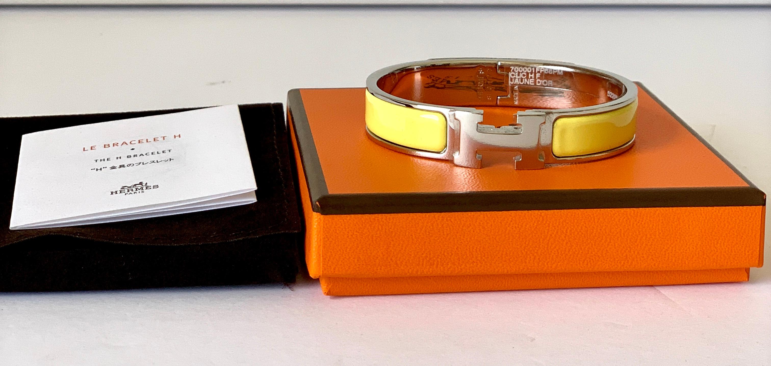Hermes Clic  H bracelet in Palladium Plated 
Enamel Bracelet
H opening
Color: Jaune Yellow
Size PM

Circumference: 7