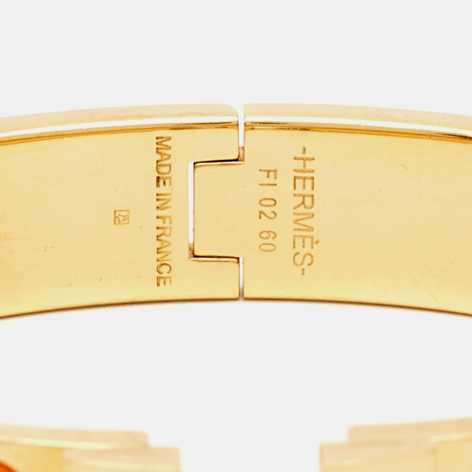 Hermes Clic H Orange Enamel Gold Plated Bracelet In Good Condition In Dubai, Al Qouz 2