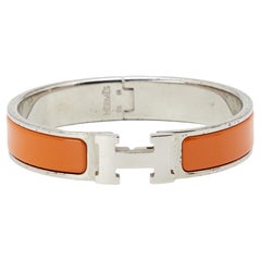 Hermes Clic H Orangefarbenes Emaille-Armband mit Palladiumverzierung