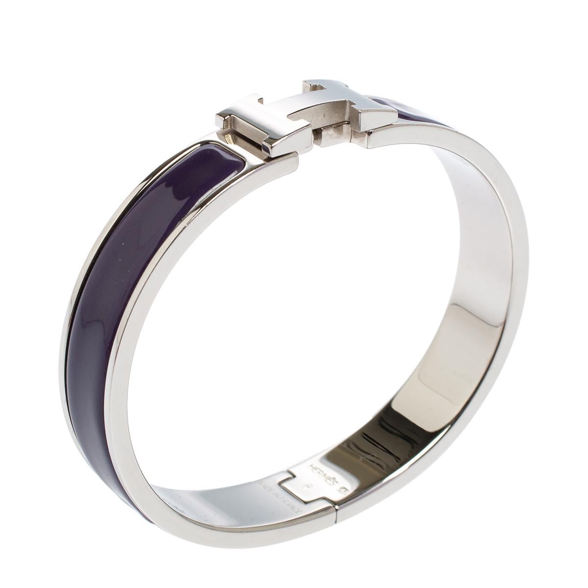 Adorn your wrist with this stunner of a bracelet from Hermès. The piece is from their Clic H collection, and it has been crafted from palladium-plated metal and designed with purple enamel. This bracelet is complete with the iconic H to the front.