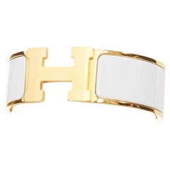 HERMES Clic H white enamel signature logo gold plated narrow cuff bracelet
