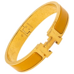 Hermès Clic H Yellow Enamel Gold Plated Narrow Bracelet PM