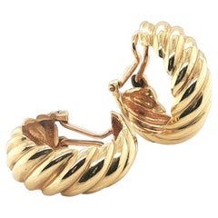 Orecchini a cerchio con chiusura a clip Hermès, in oro giallo 18 carati con motivo a spirale, vintage