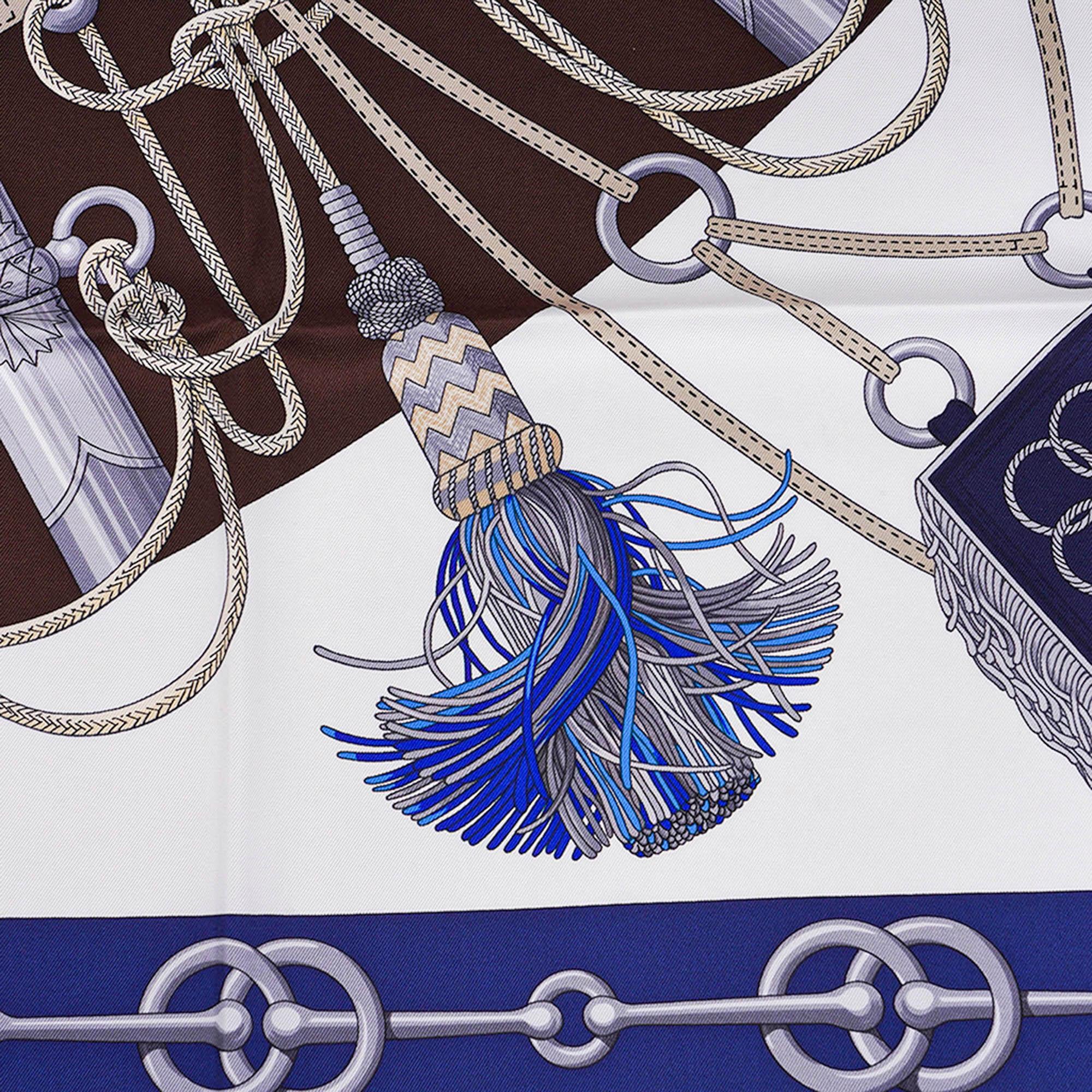 Mightychic offers an Hermes Cliquetis silk twill scarf.
Featured in Blanc, Marine and Ebene colorway.
Designed by Julie Abadie, the scarf is inspired antique pieces in the Emile Hermes collection.
The fan shaped composition was released in 1972 and