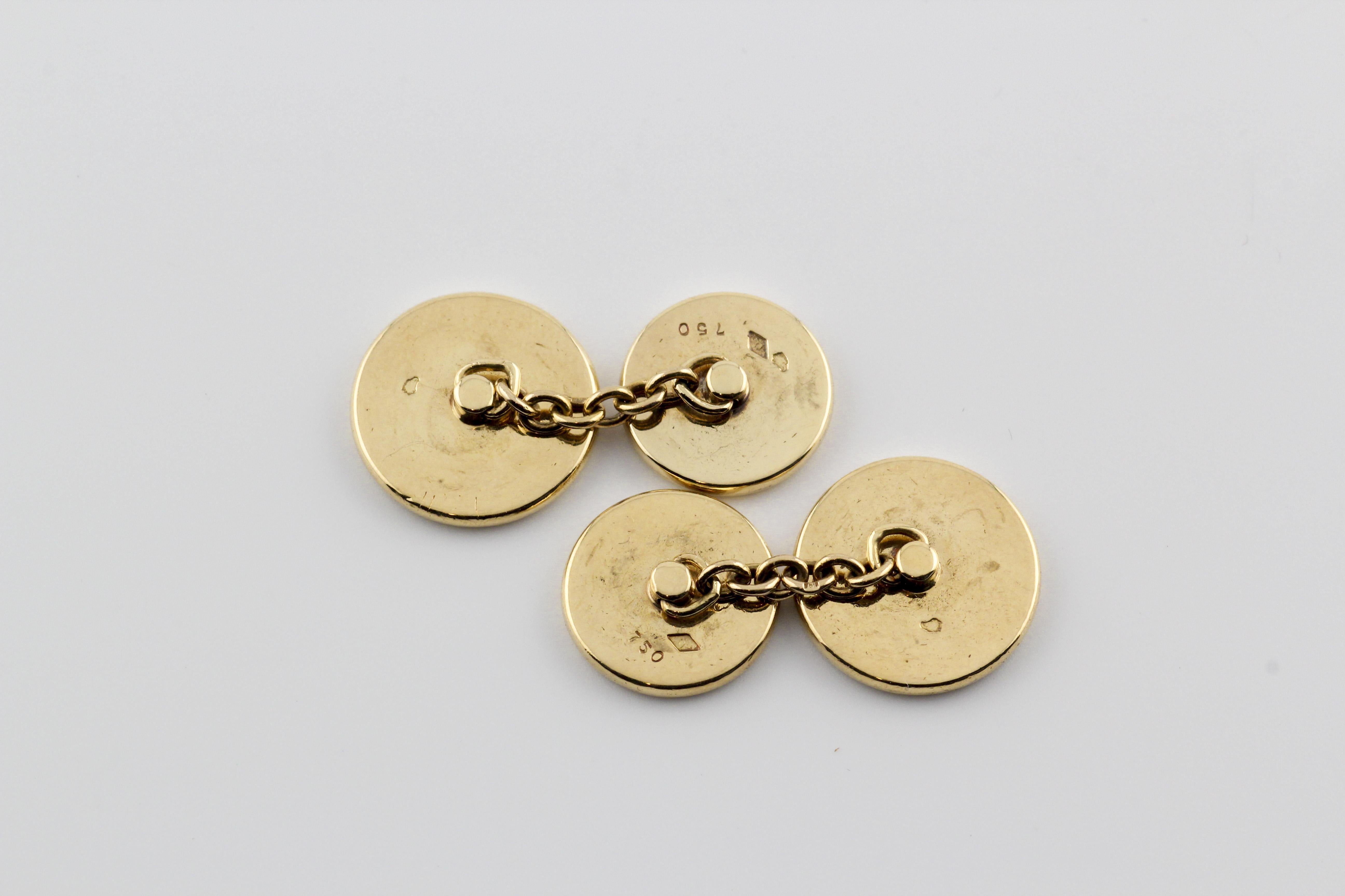 Elevate your attire with the exquisite craftsmanship of these Hermes Clou De Selle 18K Gold Disc Cufflinks. Meticulously crafted, these cufflinks are a testament to Hermes' legacy of creating exceptional accessories that seamlessly blend artistry