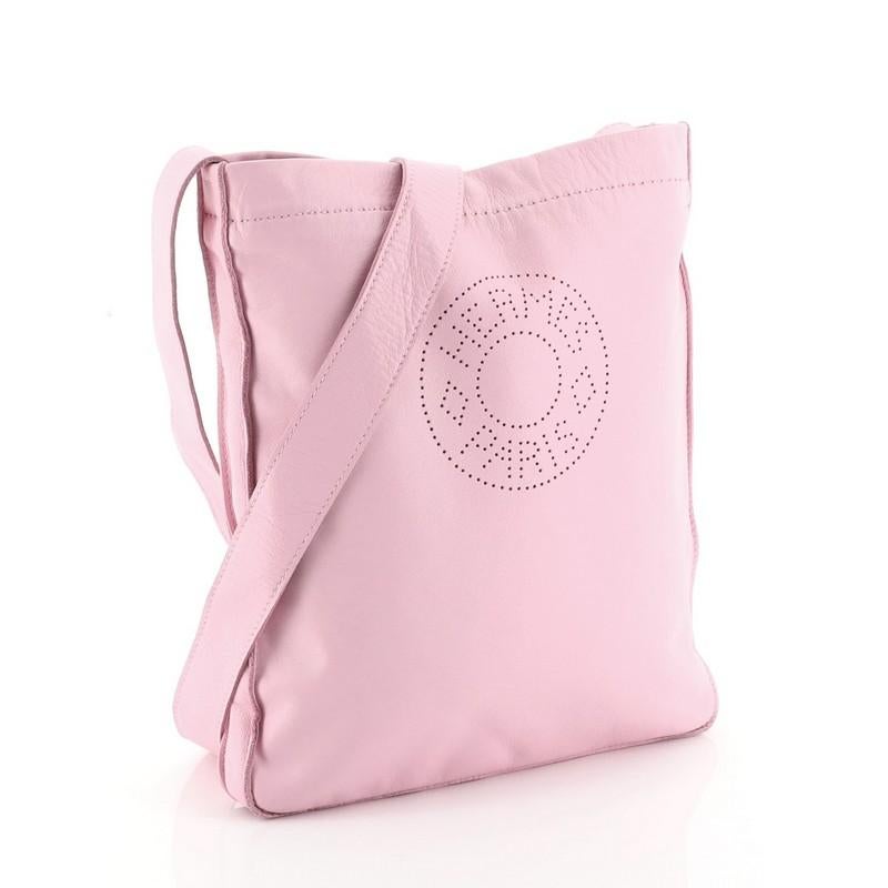 This Hermes Clou De Selle Bag Lambskin, crafted in pink Milo lambskin, features a long leather shoulder strap, Clou de Selle stamping, and palladium-tone hardware. It opens to a pink Milo lambskin interior. Date stamp reads: Square M (2009).