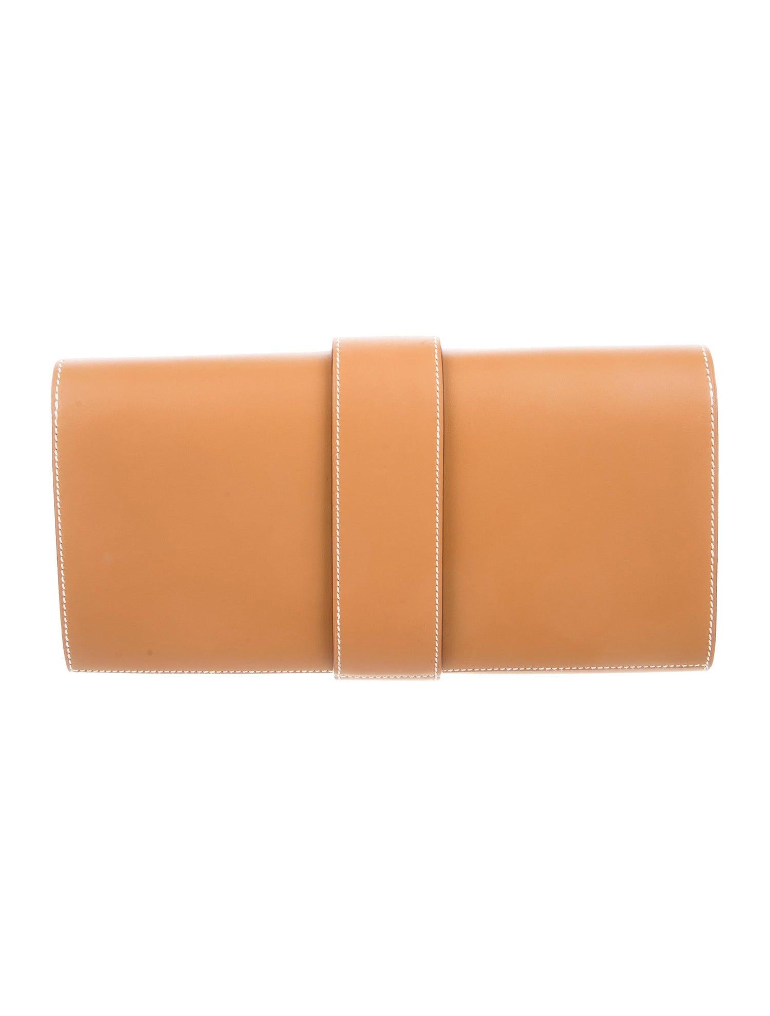 Hermes NEW Cognac Leather Gold Medor Evening Envelope Clutch Flap Bag 

Leather
Gold tone hardware
Leather lining
Slide-lock closure 
Made in France
Measures 11.25