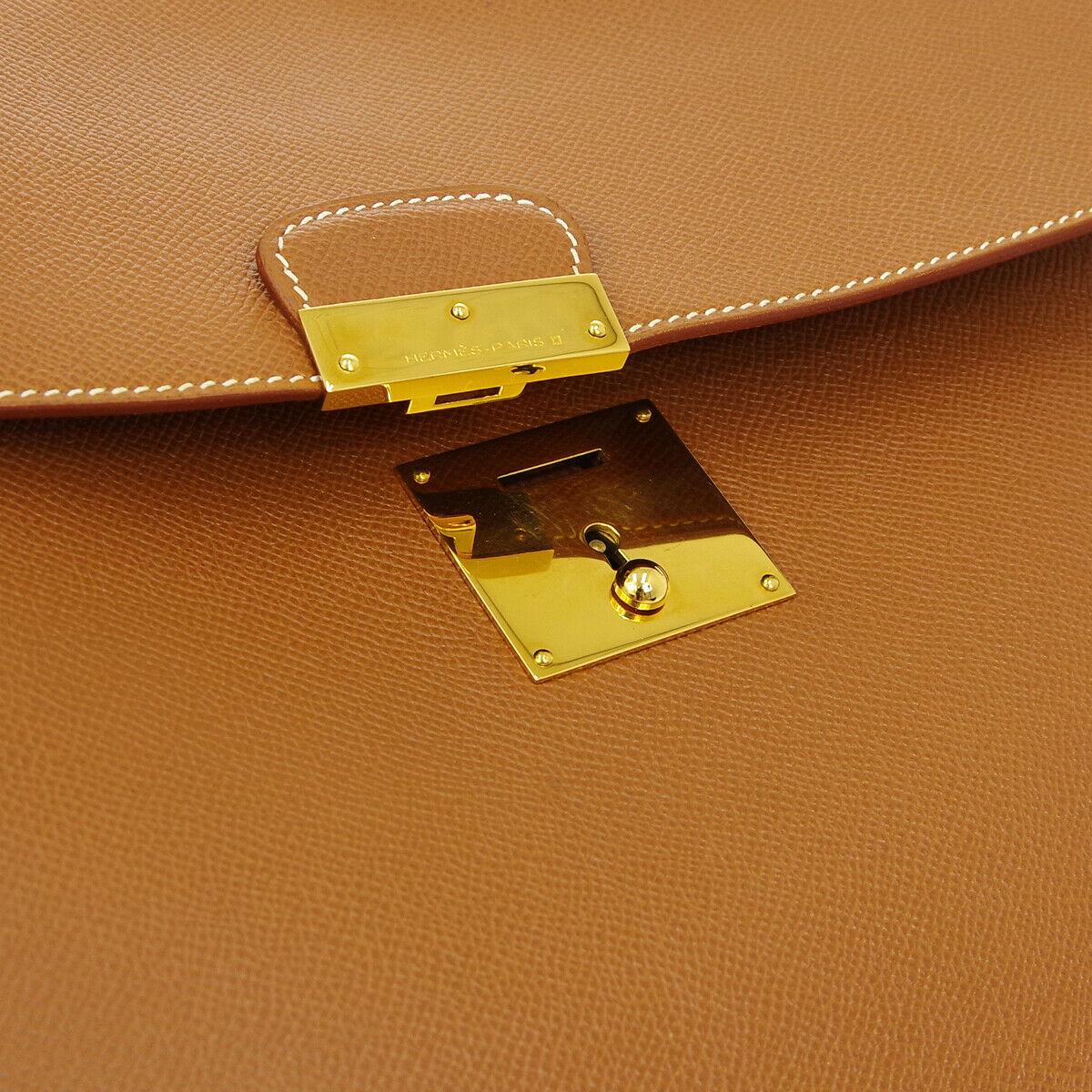 Hermes Cognac Leather Gold Men's Women's Attache Envelope Clutch Bag in Box

Leather
Gold tone hardware
Leather lining
Flip lock closure
Date code present
Made in France	
Measures 15