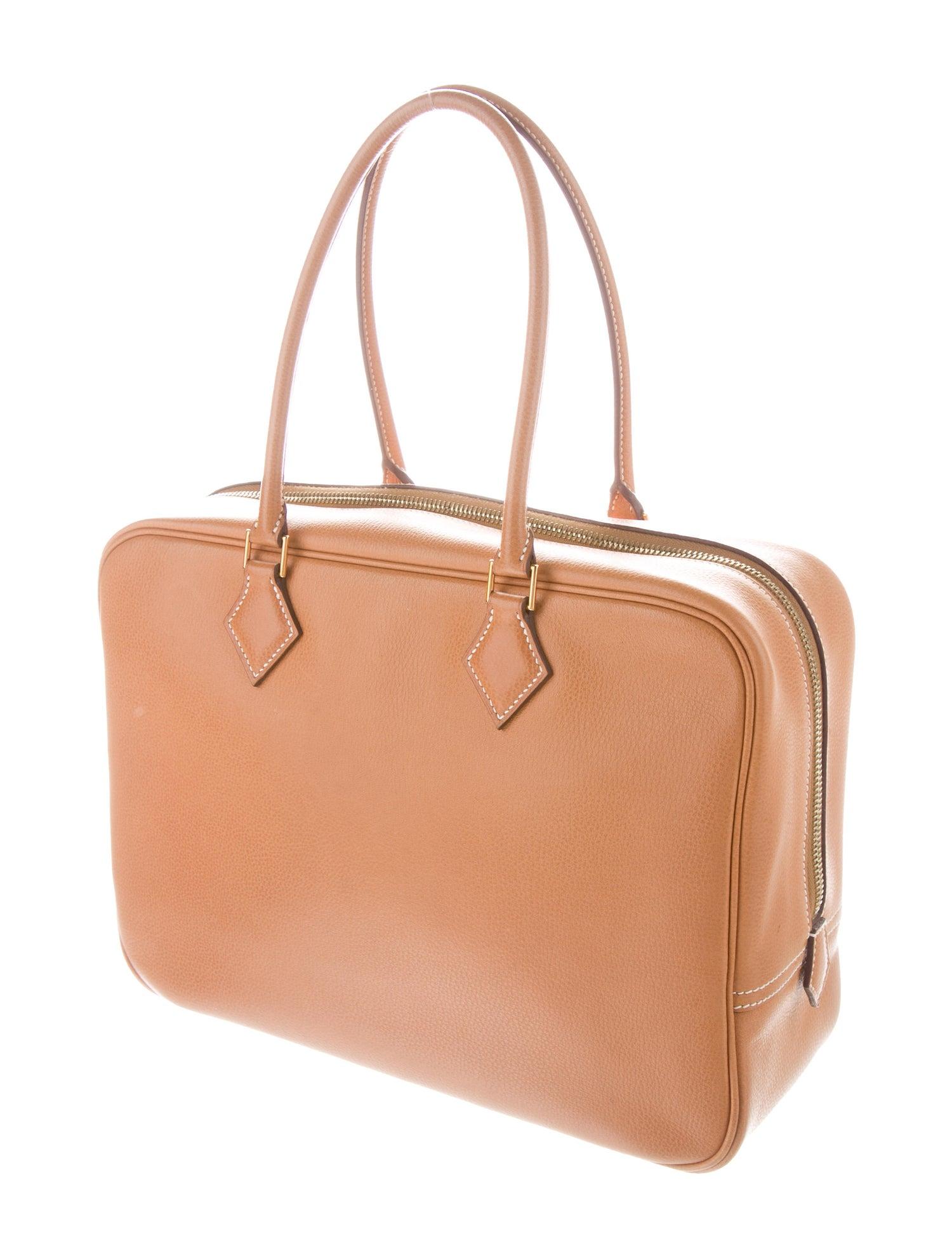 Hermes Cognac Leather Gold Top Handle Evening Satchel Carryall Tote Bag 

Leather
Gold-plated hardware
Leather lining
Zipper closure 
Made in France
Handle drop 7