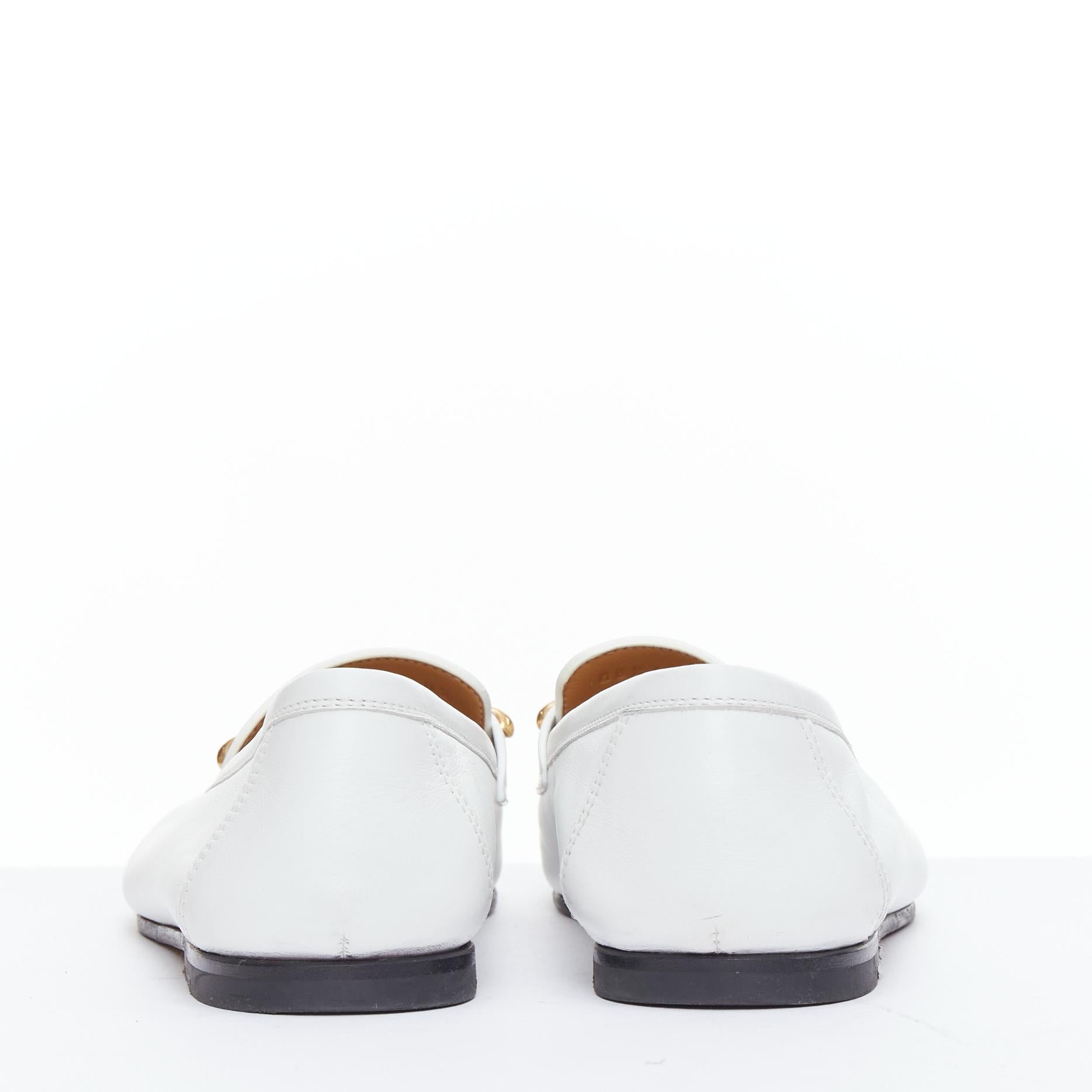 Women's HERMES Colette white goat leather gold plated Roulis buckle loafers EU37 For Sale