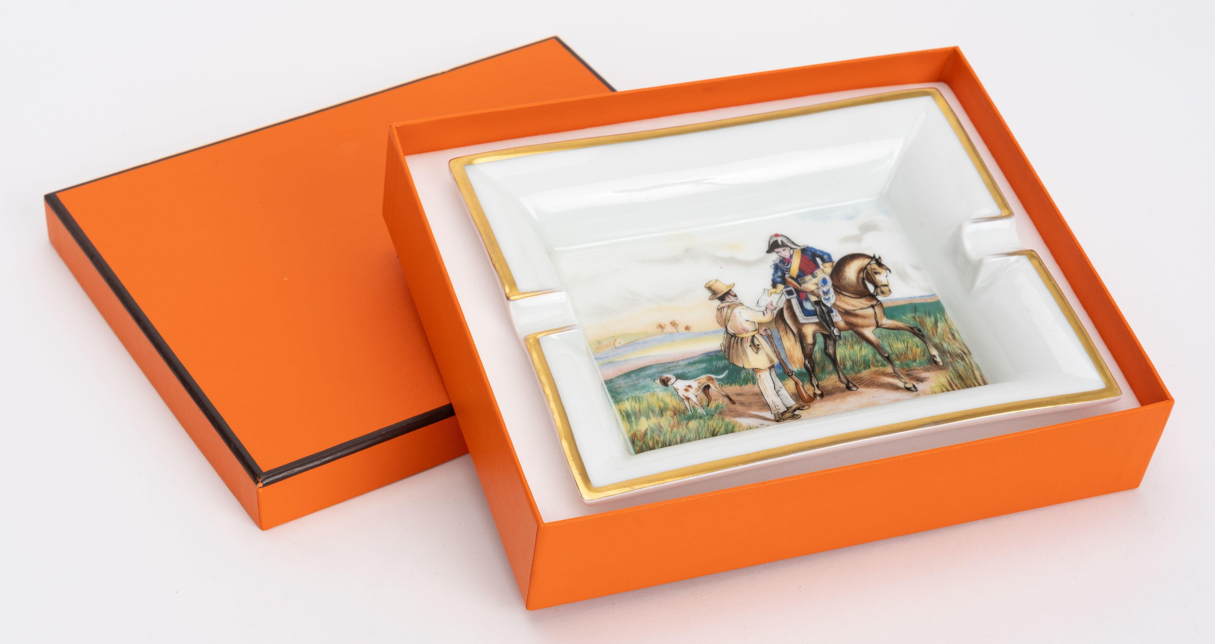 Hermès rare and collectible Napoleon porcelain ashtray . Back suede and original box.
