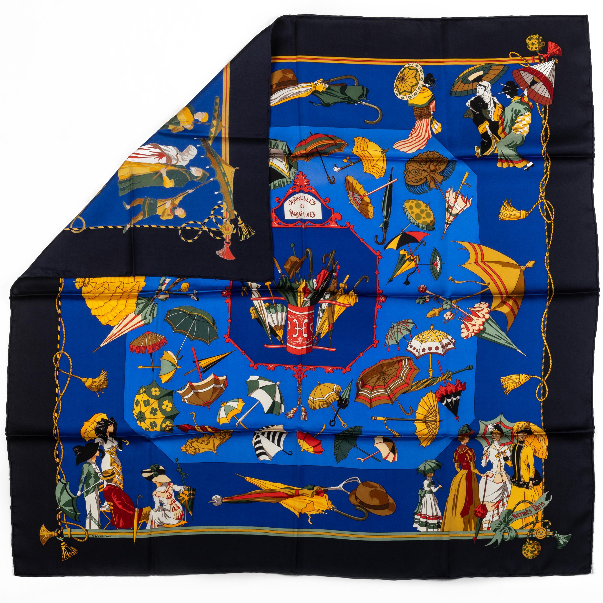 Hermes collectible umbrellas silk scarf in blue and yellow. Hand rolled edges. No box included.