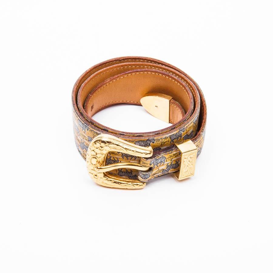 Collector! Hermès belt in printed leather representing zebras lined in gold leather. Gold-plated hardware (micro scratches), The buckle is hammered. 

In very good used condition. 75 FR 

Stamp R in a round year 1988. Stamp S comes from private